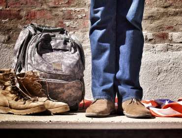 Veteran boots next to National Guard Bag